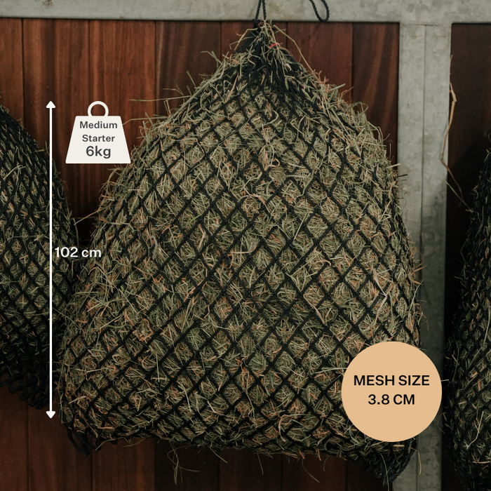 Knotless hay net for horses, designed for gentle slow feeding and improved digestive comfort.
