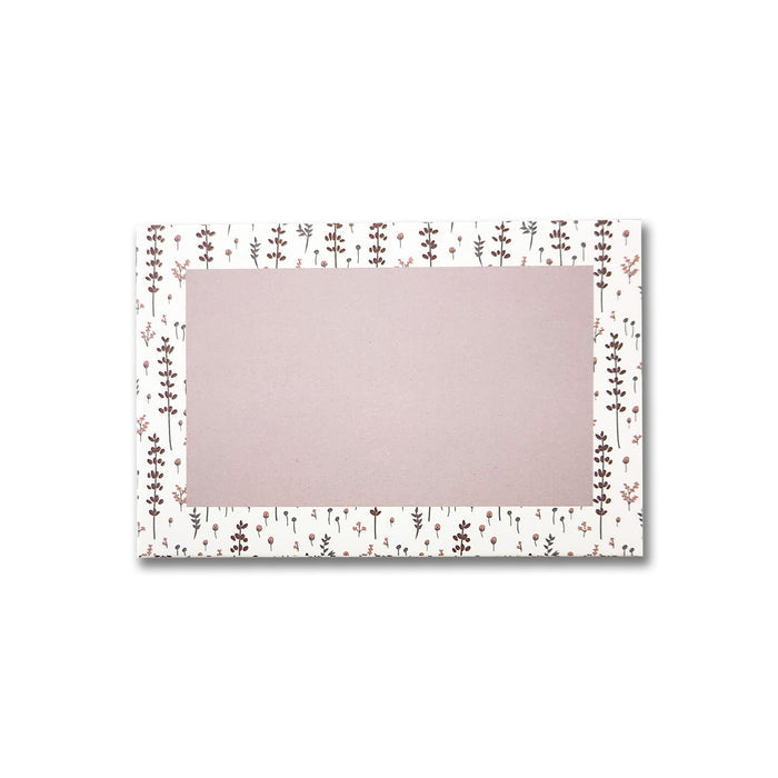 A set of Lovely Lavender Floral gift card envelopes by Maylay Co. are designed in a rectangular shape with a premium matte finish and showcase small, delicate brown and pink flowers on a white background, leaving the center as an empty space for holding a gift card.